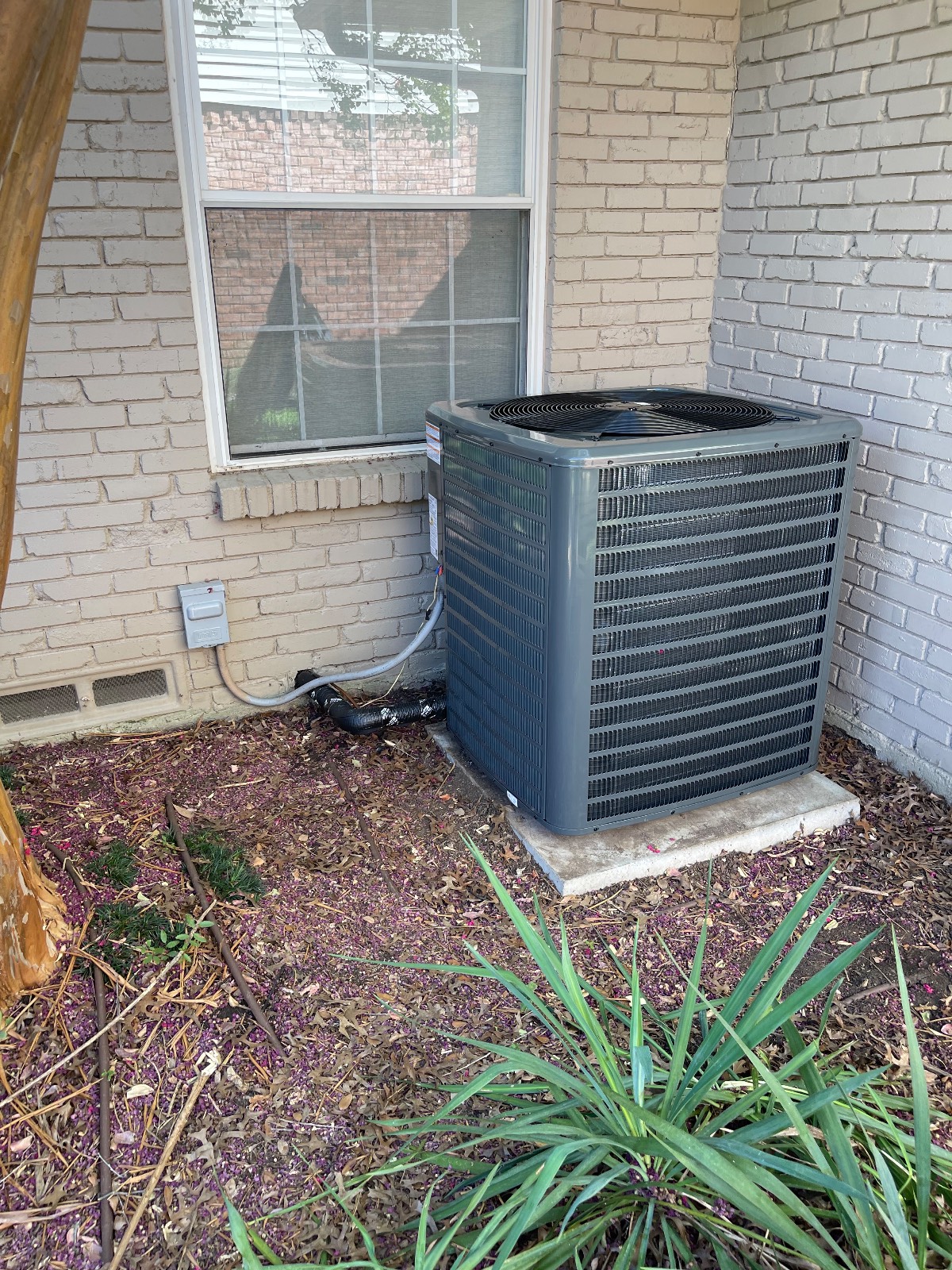 Second outdoor condenser on equipment pad